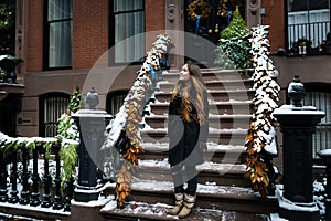 Young woman on a frosty winter Christmas morning