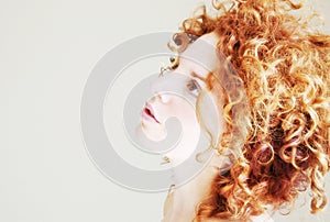 Young woman with funky curly hair