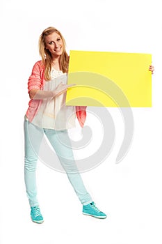 Young woman with funky yellow sign
