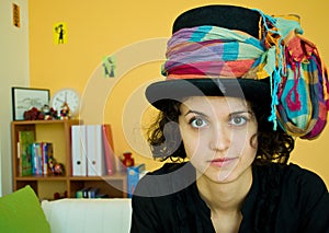 Young woman with funny hat