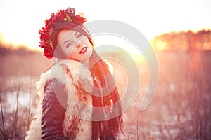 Young woman in fur vest