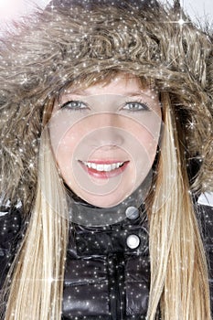 Young woman in furry hood