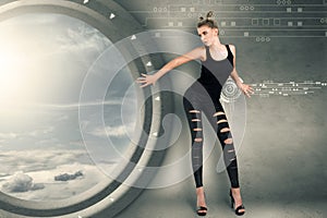 Young woman in futuristic interior