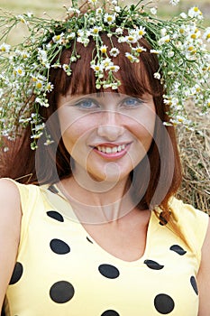 Young woman in garland