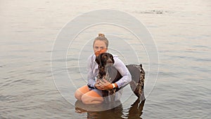 Young woman and German Shorthaired Pointer.