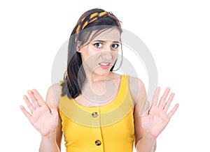 Young woman gesturing stop sign with palm of hand, refuses or reject something, isolated on white background