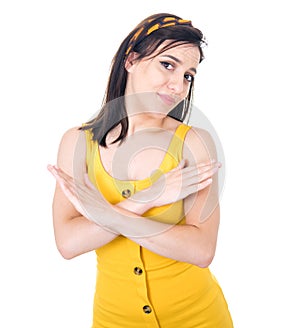 Young woman gesturing stop sign with palm of hand,refuses or reject something, isolated on white background