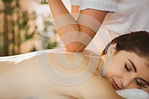 Young woman getting a massage