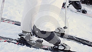 Young woman getting ready for skiing close up