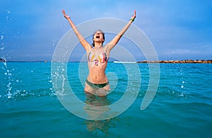 Young woman girl bath in the Ibiza beach