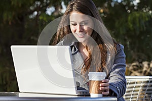 Young Woman Girl Using Laptop Drinking Coffee