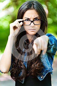 Young woman glasses frown