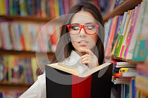 Young Woman with Glasses Reading