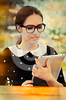 Young Woman with Glasses and Tablet