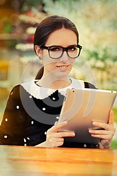 Young Woman with Glasses and Tablet