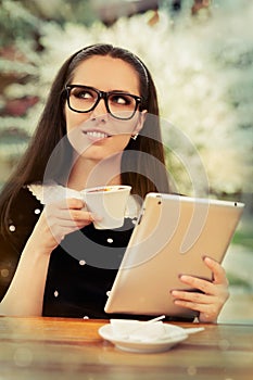 Young Woman with Glasses and Tablet Having Coffee