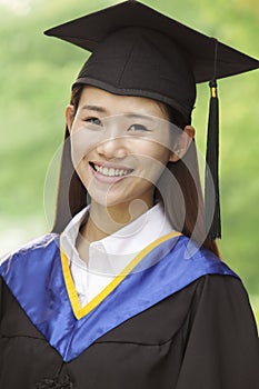 Young Woman Graduating From University, Close-Up Vertical Portrait