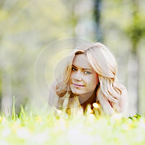 Young woman on grass