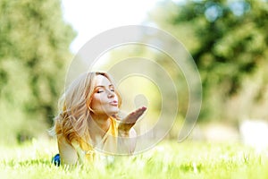 Young woman on grass