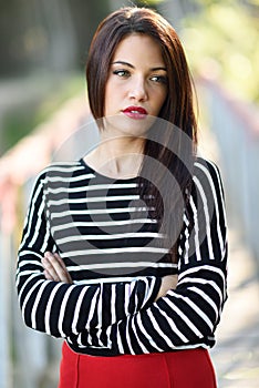 Young woman with green eyes wearing young clothing