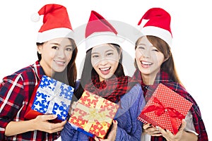 young woman group in santa hat with gift box