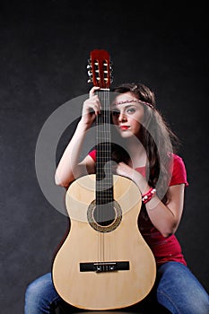 Young woman with guitar