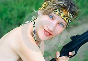 Young woman with gun