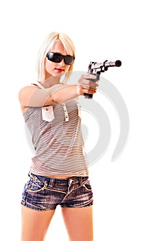 Young woman with gun isolated