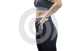 Young  woman in a gym  exercises