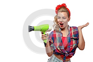 Young woman with hairdryer photo