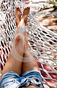 Young woman in hammock.