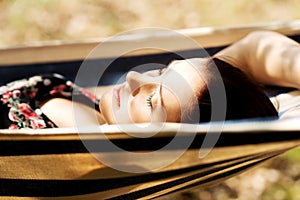 Young woman in hammock