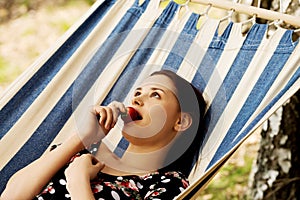 Young woman in hammock