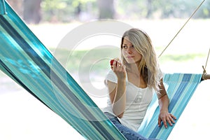 Young woman in a hammock