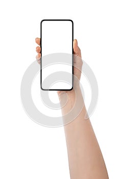 Young woman hand holding generic smartphone with white screen on white background