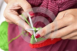 Young woman hand knitting