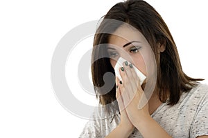 Young woman with handkerchief having cold