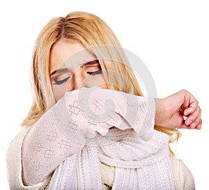 Young woman with handkerchief having cold.