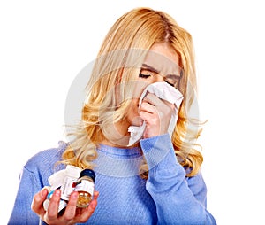 Young woman with handkerchief having cold.