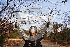 Young Woman Hands Holding Sign Said Free Your Mind