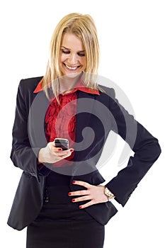 Young woman happily writing sms