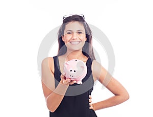 Young woman with happy with piggy bank