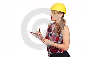 Young woman with hard hat and writing board