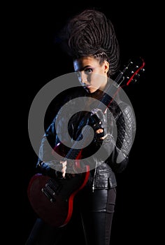 Young woman hard rock musician