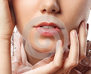 Young woman has chapped lips photo