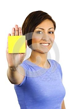 Young woman has a post-it note stuck on her hand.