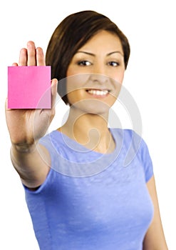 Young woman has a sticky note stuck on her hand.