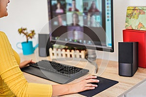 Young woman having a discussion meeting in video call with her team - Girl having chatting with friends on computer web app -