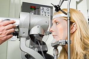 Young woman having eye test