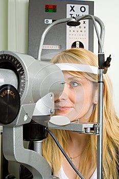 Young woman having eye test